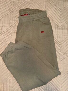 Supreme Sage Green Sweatpants with Red Logo Tag